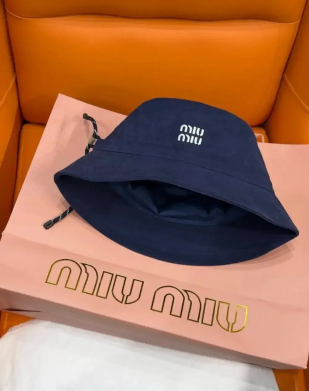 Miu Miu Navy Blue Logo Embroidered Bucket Hat with Drawstring